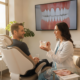 Dentist consulting with a patient about zirconia teeth options in a modern dental office.