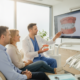Patient discussing dental implant options with a dentist in a modern office